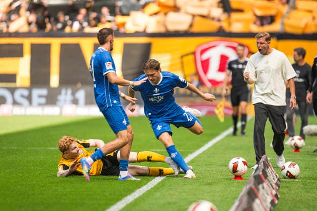 16.08.2026, xomx, Fussball 2.Bundesliga, Dynamo Dresden - SV Darmstadt 98 v.l. Carlo Sickinger (SV Darmstadt 98) und Robert Wagner (Dynamo Dresden) im Zweikampf am Ball (DFL DFB REGULATIONS PROHIBIT ANY USE OF PHOTOGRAPHS as IMAGE SEQUENCES and or QUASI-VIDEO) Dresden *** August 16, 2026, xomx, Soccer, 2. Bundesliga: Dynamo Dresden vs. SV Darmstadt 98. Photo by Carlo Sickinger. SV Darmstadt 98’s Robert Wagner and Dynamo Dresden’s Robert Wagner battle for the ball. DFL and DFB regulations prohibit any use of photographs as image sequences and or quasi-video. Dresden