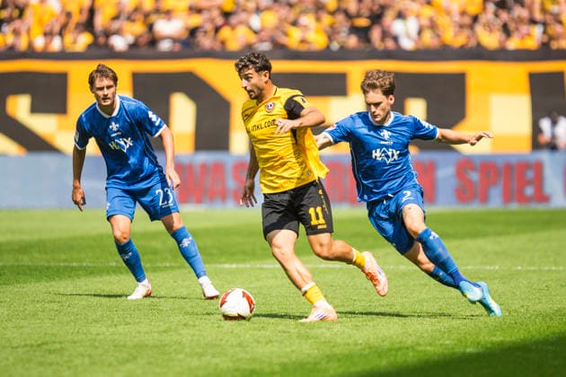 16.08.2026, xomx, Fussball 2.Bundesliga, Dynamo Dresden - SV Darmstadt 98 v.l. Carlo Sickinger (SV Darmstadt 98), Kaan Inagonoglu (Dynamo Dresden), Florian Kleinhansl (SV Darmstadt 98) am Ball (DFL DFB REGULATIONS PROHIBIT ANY USE OF PHOTOGRAPHS as IMAGE SEQUENCES and or QUASI-VIDEO) Dresden *** August 16, 2026, xomx, Soccer 2. Bundesliga, Dynamo Dresden vs. SV Darmstadt 98, photo by Carlo Sickinger, SV Darmstadt 98, Kaan Inagonoglu, Dynamo Dresden; Florian Kleinhansl, SV Darmstadt 98, with the ball. DFL and DFB regulations prohibit any use of photographs as image sequences and or quasi-video. Dresden