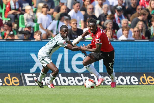 16.08.2026, xtgx, Fussball 2. Bundesliga, Hannover 96 - VfL Wolfsburg, v.l. Sael Kumbedi (Wolfsburg, 26) Mustapha Bundu (Hannover, 7) Zweikampf, Duell, Kampf, tackle (DFL DFB REGULATIONS PROHIBIT ANY USE OF PHOTOGRAPHS as IMAGE SEQUENCES and or QUASI-VIDEO) Hannover *** August 16, 2026, xtgx, Soccer 2. Bundesliga, Hannover 96 vs. VfL Wolfsburg, from left: Sael Kumbedi (Wolfsburg), 26 Mustapha Bundu (Hannover), 7 tackle, duel, battle, tackle DFL DFB REGULATIONS PROHIBIT ANY USE OF PHOTOGRAPHS as IMAGE SEQUENCES and or QUASI-VIDEO Hannover