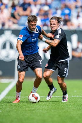16.08.2026 - Fußball, 2026 2027, 2. Bundesliga, 2. Spieltag, DSC Arminia Bielefeld - FC Energie Cottbus: (L-R) Joel Grodowski (Bielefeld), Henry Rorig (Cottbus) DFL REGULATIONS PROHIBIT ANY USE OF PHOTOGRAPHS AS IMAGE SEQUENCES AND OR QUASI-VIDEO. *** August 16, 2026 Soccer, 2026–2027, 2. Bundesliga, Matchday 2, DSC Arminia Bielefeld vs. FC Energie Cottbus; Referee: Joel Grodowski (Bielefeld), Assistant Referee: Henry Rorig (Cottbus); DFL regulations prohibit any use of photographs as image sequences and or quasi-video.