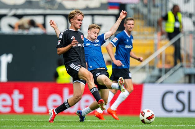 16.08.2026 - Fußball, 2026 2027, 2. Bundesliga, 2. Spieltag, DSC Arminia Bielefeld - FC Energie Cottbus: (L-R) Lukas Michelbrink (Cottbus), Sam Schreck (Bielefeld) DFL REGULATIONS PROHIBIT ANY USE OF PHOTOGRAPHS AS IMAGE SEQUENCES AND OR QUASI-VIDEO. *** August 16, 2026 Soccer, 2026–2027, 2. Bundesliga, Matchday 2, DSC Arminia Bielefeld vs. FC Energie Cottbus; Referee: Lukas Michelbrink (Cottbus), Assistant Referee: Sam Schreck (Bielefeld). DFL regulations prohibit any use of photographs as image sequences and or quasi-video.