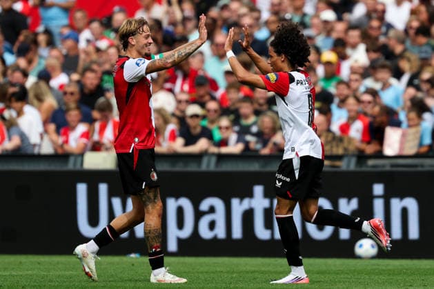 2026-08-16 Feyenoord v Go Ahead Eagles - Dutch Eredivisie ROTTERDAM, NETHERLANDS - AUGUST 16: Gjivai Zechiel of Feyenoord, Luciano Valente of Feyenoord celebrates after scoring the first goal of the team during the Dutch Eredivisie match between Feyenoord and Go Ahead Eagles at Stadion Feijenoord on August 16, 2026 in Rotterdam, Netherlands. Rotterdam Stadion Feijenoord Netherlands Content not available for redistribution in The Netherlands directly or indirectly through any third parties. Copyright: xHansxvanxderxValkx