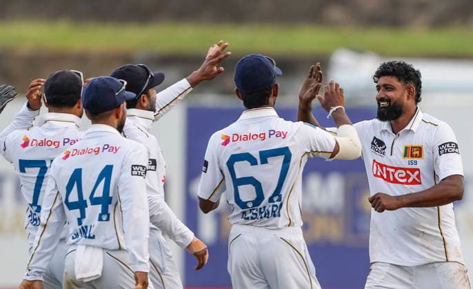 IND vs SL, 1st Test, Day 2 Galle Sri Lanka , Aug 16 (ANI): Sri Lanka s Prabath Jayasuriya and teammates celebrate the wicket of India s Dhruv Jurel during day 2 of the 1st Test match, at Galle International Stadium in Galle on Sunday. Galle Sri Lanka Copyright: xANIx ANI_20260816271