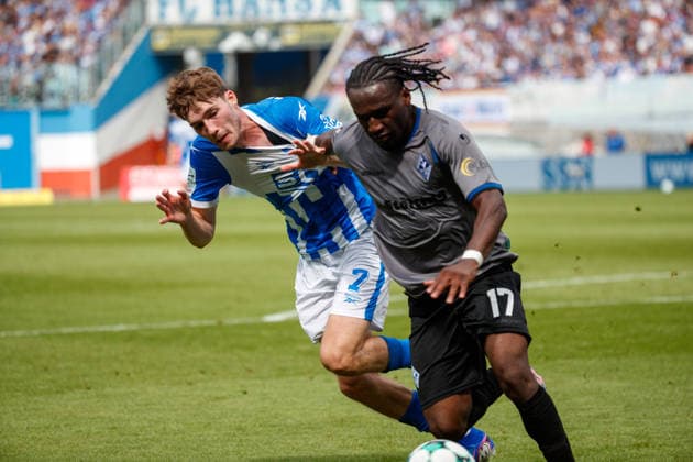 vorn Darnell Keumo (Waldhof) gegen Bernie Lennemann (Rostock) ; GER, FC Hansa Rostock vs. SV Waldhof Mannheim, Fußball, Männer, 3.Liga, 02.Spieltag, Spielzeit 2026 2027, 16.08.2026 Rostock Ostseestadion Mecklenburg - Vorpommern Deutschland *** Starting lineup: Darnell Keumo (Waldhof) vs. Bernie Lennemann (Rostock, GER), FC Hansa Rostock vs. SV Waldhof Mannheim, Soccer, Men, 3rd Division, Matchday 2, 2026–2027 Season, August 16, 2026, Rostock Ostseestadion, Mecklenburg-Western Pomerania, Germany