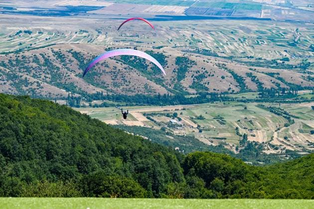 (260816) -- KRUSHEVO, Aug. 16, 2026 -- Participants compete during the 18th World Air Sports Federation (FAI) European Paragliding Championships in Krushevo, North Macedonia, Aug.16, 2026. The event is taking place from Aug. 8 to 19, bringing together 130 of Europe s top pilots. (Photo by Tomislav Georgiev Xinhua) (SP)NORTH MACEDONIA-KRUSHEVO-EUROPEAN PARAGLIDING CHAMPIONSHIPS LinxHao 