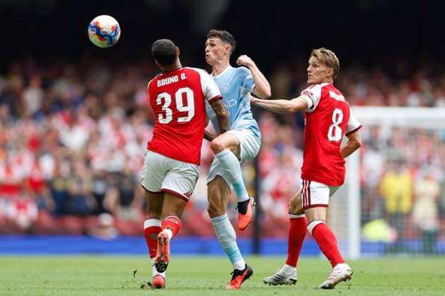 Phil Foden of Manchester City (middle) battles for the ball with Bruno Guimaraes of Arsenal (left) and Martin Odegaard (right) Arsenal v Manchester City, FA Community Shield, Principality Stadium, Cardiff, UK - 16 Aug 2026Cardiff Principality Stadium United Kingdom EDITORIAL USE ONLY No use with unauthorised audio, video, data, fixture lists, club league logos or live services. Online in-match use limited to 120 images, no video emulation. No use in betting, games or single club league player publications.  Copyright: xMattxImpey Shutterstockx 17096419bt