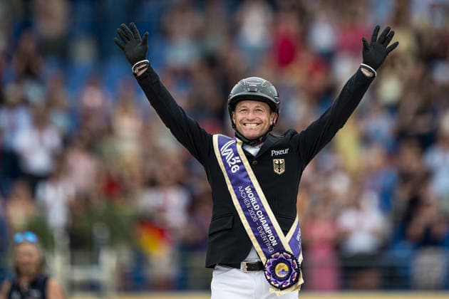 260816 Michael Jung of Germany with horse fischerChipmunk celebrates on the podium with his god medal after the Eventing Show Jumping Final during day 6 of the 2026 FEI World Championships on August 16, 2026 in Aachen. Photo: Emma Wallskog BILDBYRAN kod EW EW0687 ridsport equestrian rid-vm 2026 2026 fei world championships bbeng ridsport-vm fälttävlan eventing jubel guld gold *** August 16, 2026: Michael Jung of Germany, riding FischerChipmunk, celebrates on the podium with his gold medal after the Eventing Show Jumping Final on Day 6 of the 2026 FEI World Championships, 2026 in Aachen. Photo by Emma Wallskog. BILDBYRAN code EW EW0687. equestrian sports, 2026 World Championships, 2026 FEI World Championships, BBENG, equestrian sports, World Championships, eventing, celebration, gold  Copyright: EMMAxWALLSKOG BB260816EW043