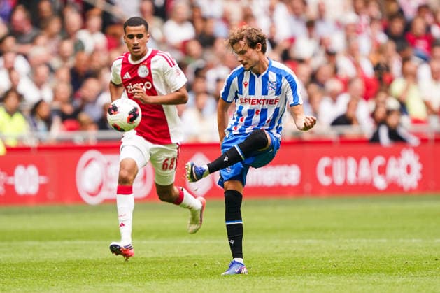 2026-08-16 AFC Ajax v sc Heerenveen - Dutch Vrienden Loterij Eredivsie AMSTERDAM, NETHERLANDS - AUGUST 16: Jacob Trenskow of sc Heerenveen hits the ball during a Dutch Vrienden Loterij Eredivsie at Johan Cruijff ArenA on August 16, 2026 in Amsterdam, Netherlands. Amsterdam Johan Cruijff ArenA Netherlands Content not available for redistribution in The Netherlands directly or indirectly through any third parties. Copyright: xAndrexWeeningx
