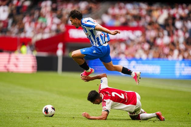 2026-08-16 AFC Ajax v sc Heerenveen - Dutch Vrienden Loterij Eredivsie AMSTERDAM, NETHERLANDS - AUGUST 16: Vasilios Zagaritis of sc Heerenveen battles for possession with Lucas Rosa of AFC Ajax during a Dutch Vrienden Loterij Eredivsie at Johan Cruijff ArenA on August 16, 2026 in Amsterdam, Netherlands. Amsterdam Johan Cruijff ArenA Netherlands Content not available for redistribution in The Netherlands directly or indirectly through any third parties. Copyright: xAndrexWeeningx
