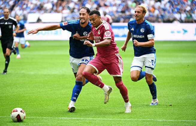 Gelsenkirchen, Germany, 1. Bundesliga, Friendly Match, Veltins Arena Gelsenkirchen, FC Schalke 04 - Real Madrid; Kylian Mbappe (RMA), Nikola Katic (S04), Timo Becker (S04). Action *** Gelsenkirchen, Germany, Bundesliga 1, Friendly Match, Veltins Arena Gelsenkirchen, FC Schalke 04 vs. Real Madrid, Kylian Mbappé (RMA), Nikola Katic (S04), Timo Becker (S04), Action