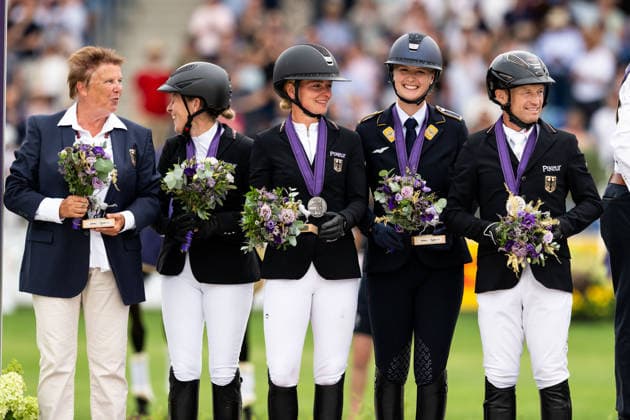 260816 Team Germany (Malin Hansen-Hotopp, Julia Krajewski, Libussa Lubbecke and Michael Jung) celebrate on the podium after winning team silver medal in the Eventing Show Jumping Final during day 6 of the 2026 FEI World Championships on August 16, 2026 in Aachen. Photo: Emma Wallskog BILDBYRAN kod EW EW0687 ridsport equestrian rid-vm 2026 2026 fei world championships bbeng ridsport-vm fälttävlan eventing *** August 16, 2026: Team Germany—Malin Hansen Hotopp, Julia Krajewski, Libussa Lubbecke, and Michael Jung—celebrate on the podium after winning the team silver medal in the Eventing Show Jumping Final on Day 6 of the 2026 FEI World Championships on August 16, 2026 in Aachen. Photo: Emma Wallskog. BILDBYRAN code EW EW0687. equestrian sports, riding, 2026 World Championships, 2026 FEI World Championships, BBENG, equestrian sports, World Championships, eventing  Copyright: EMMAxWALLSKOG BB260816EW058