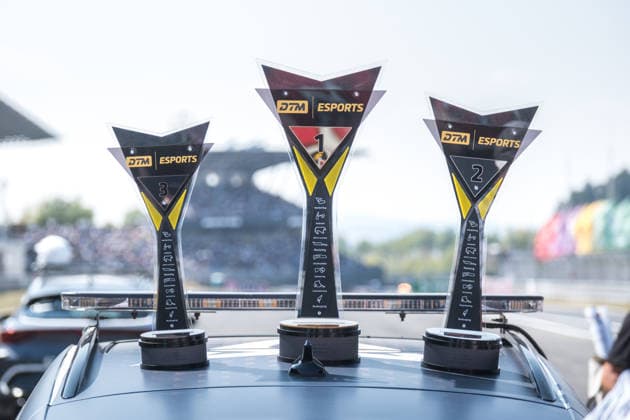 16.08.2026, GER, Motorsport, ADAC DTM, Saison 2026, Nürburgring Sieger-Pokale der DTM E-Sports auf dem Dach eines CUPRA Formentor in der Startaufstellung zum Sonntagsrennen der DTM Nürburg Nürburgring Rheinland-Pfalz Deutschland *** August 16, 2026, GER, Motorsports, ADAC DTM, 2026 Season, Nürburgring: DTM eSports winner’s trophies on the roof of a CUPRA Formentor on the starting grid for Sunday’s DTM race at the Nürburgring, Rhineland-Palatinate, Germany Copyright: xnordphotoxGmbHx xKnabx