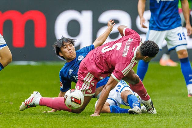 Satoshi Tanaka (FC Schalke 04) und Jude Bellingham (Real Madrid CF) battle for the ball during the during the Pre-Season Friendly match between FC Schalke 04 and Real Madrid at Veltins Arena on August 16, 2026 in Gelsenkirchen, Germany. (Photo by Mario Hommes DeFodi Images) - *** Satoshi Tanaka of FC Schalke 04 and Jude Bellingham of Real Madrid CF battle for the ball during the preseason friendly match between FC Schalke 04 and Real Madrid at Veltins Arena on August 16, 2026, in Gelsenkirchen, Germany. Photo by Mario Hommes, DeFodi Images
