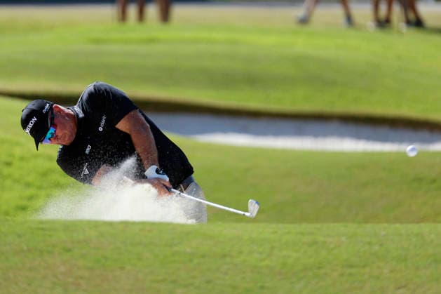 MEMPHIS, TN - AUGUST 16: Ryan Fox of New Zealand hits from a bunker on No. 18 during the final round of the FedEx St. Jude Championship, August 16, 2026, at TPC Southwind in Memphis, Tennessee. (Photo by Matthew Maxey Icon Sportswire) GOLF: AUG 16 PGA, Golf Herren FedEx St. Jude Championship EDITORIAL USE ONLY Icon260816002