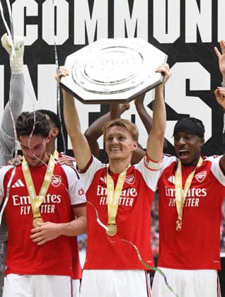 CARDIFF, WALES - AUGUST 16: Martin odegaard of Arsenal lifts the FA Community Shield after the 2026 FA Community Shield match between Arsenal and Manchester City at Principality Stadium on August 16, 2026 in Cardiff, Wales.  Copyright: xMBxMediax