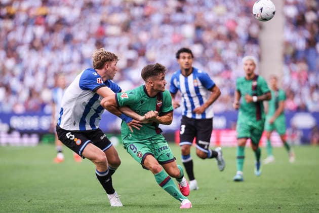 August 16, 2026, Cornella, Barcelona, SPAIN: Ivan Romero of Levante UD and Clemens Riedel of RCD Espanyol fight for the ball during the Spanish league, LaLiga EA Sports, football match played between RCD Espanyol and Levante UD at RCDE Stadium on August 16, 2026 in Cornella, Spain. RCD Espanyol V Levante UD - LaLiga EA Sports  - ZUMAa181 20260816_zaa_a181_067 Copyright: xJavierxBorregox