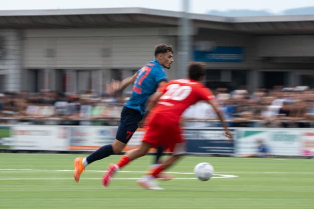 KERZERS, FRIBOURG, SWITZERLAND - AUGUST 16: Donat Rudhani of FC Sion challenges Armando Waeber of FC Kerzers during the Swiss Cup first round match between FC Kerzers and FC Sion at Stadion Erli on August 16, 2026 in Kerzers, Fribourg, Switzerland.  Copyright: xLivioxBaeriswylx xSPPx Sportspressphoto_SPR209042