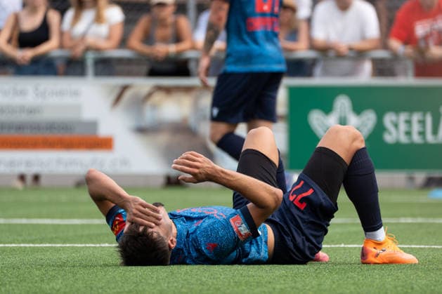 KERZERS, FRIBOURG, SWITZERLAND - AUGUST 16: Donat Rudhani of FC Sion lies on the pitch after being fouled during the Swiss Cup first round match between FC Kerzers and FC Sion at Stadion Erli on August 16, 2026 in Kerzers, Fribourg, Switzerland.  Copyright: xLivioxBaeriswylx xSPPx Sportspressphoto_SPR209045