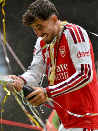 Football - 2026 FA Community Shield - Arsenal vs. Manchester City - Principality (Millennium) Stadium, Cardiff - Sunday 16th August 2026 Kai Havertz ARSENAL celebrates with champagne Pic- COLORSPORT Winston Bynorth 