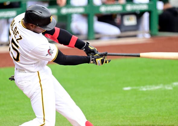 Pittsburgh Pirates right fielder Esmerlyn Valdez (55) hits a double and goes on to score later in the first inning against the Boston Red Sox at PNC Park on Sunday, Aug. 16, 2026 in Pittsburgh.  PIT2026081608 ArchiexCarpenter