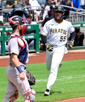 Pittsburgh Pirates right fielder Esmerlyn Valdez (55) scores in the first inning against the Boston Red Sox at PNC Park on Sunday, Aug. 16, 2026 in Pittsburgh.  PIT2026081610 ArchiexCarpenter