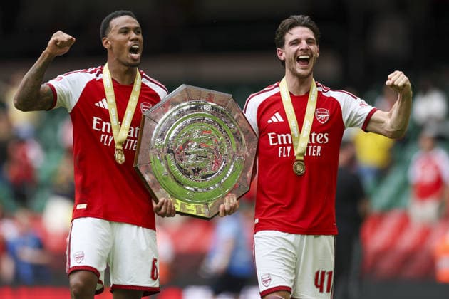 CARDIFF, WALES, AUG 16: Gabriel Magalhães and Declan Rice of Arsenal celebrate with trophy after Arsenal win the FA Community Shield match between Arsenal and Manchester City at the Millennium Stadium in Cardiff, Wales on 16th of August (photo by Qian Jun Sports Press Photo)  Copyright: xQianxJun SportsxPressxPhotox Sportspressphoto_SPR209573