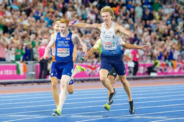 BIRMINGHAM, GREAT BRITAIN - AUGUST 16, 2026 : Charles DOBSON (GBR Great Britain) and Lorenzo BENATI (ITA Italy) competing in the 4x400m relay during the European Athletics Championships at Alexander Stadium on August 16, 2026 in Birmingham, Great Britain. Great Britain Copyright: xLeahxKohringx