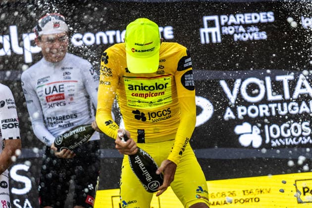 87th Volta A Portugal - 10th Stage French cyclist Alexis Guerin of Anicolor Campicarn celebrates on the podium after winning the general classification of the 87th Volta a Portugal, following the final stage from Maia to Porto, Portugal, on August 16, 2026. Porto Portugal  Copyright: xEduardoxAlmeidax originalFilename:almeida-notitle260816_npJkS.jpg