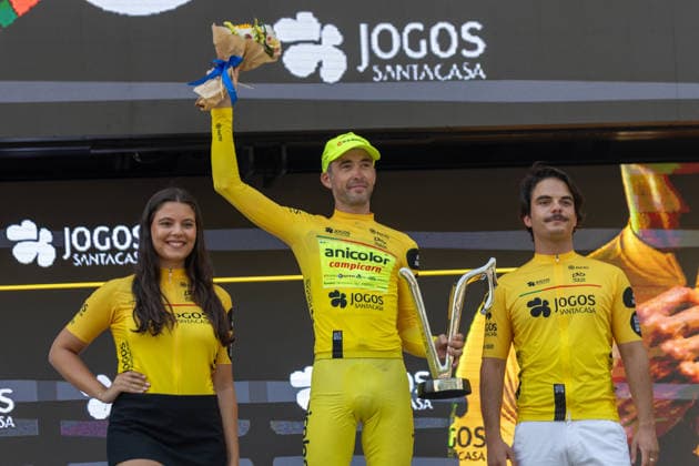 87th Volta A Portugal - 10th Stage French cyclist Alexis Guerin of Anicolor Campicarn celebrates on the podium after winning the general classification of the 87th Volta a Portugal, following the final stage from Maia to Porto, Portugal, on August 16, 2026. Porto Portugal  Copyright: xEduardoxAlmeidax originalFilename:almeida-notitle260816_nptlA.jpg