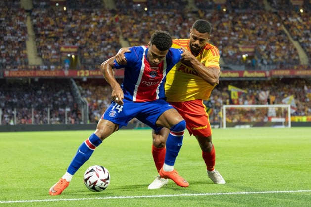 RC Lens vs PSG football match - Lens PSG s French forward 14 Desire Doue looks on during the French Super Cup (Trophee des Champions) football match between RC Lens and Paris Saint-Germain (PSG) at the Stade Bollaert-Delelis in Lens, northern France on August 16, 2026. Photo by Raphael Lafargue ABACAPRESS.COM Lens France  Copyright: xLafarguexRaphael ABACAx