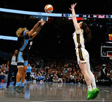Guard Te-Hina Paopao 2 of the Atlanta Dream shoots over guard Caitlin Clark 8 of the Indiana Fever in the second half at State Farm Arena on Sunday, August 16, 2026 in Atlanta, Georgia.  ATL2026081610 MikexZarrilli