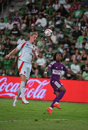 AUSTIN, TX - August 16: FC Dallas defender Herman Johansson (14) heads a ball while Austin FC player Jayden Nelson (right) looks on during MLS, Fussball Herren, USA game between FC Dallas and Austin FC on August 16, 2026 at Q2 Stadium in Austin, TX. (Photo by John Rivera Icon Sportswire) SOCCER: AUG 16 MLS Austin FC vs FC Dallas EDITORIAL USE ONLY Icon426260816022