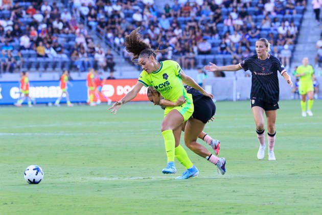 August 16, 2026, Los Angeles, California, USA: Sarah Gorden 11 of the Angel City FC hooks an arm around Trinity Rodman 2 of the Washington Spirit during their regular season NWSL game on Sunday August 16, 2026 at the BMO Stadium in Los Angeles, California. ACFC tie with Spirit, 1-1. ARIANA RUIZ PI Los Angeles USA - ZUMAp124 20260816_zaa_p124_033 Copyright: xArianaxRuizx