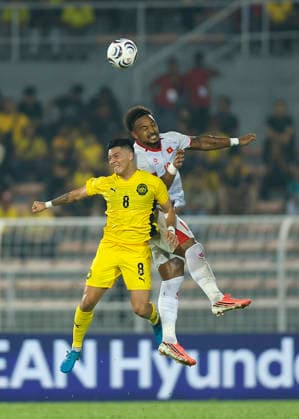 Malaysia Vs Vietnam in Kuala Lumpur, Malaysia - 16 Aug 2026 Xuan Son Nguyen of Vietnam (R) and Sergio Fabian Ezequiel Aguero of Malaysia seen in action during the ASEAN Hyundai Cup 2026 First-Leg Semi-Final match between Malaysia and Vietnam at Kuala Lumpur Football Stadium. Final score; Malaysia 0:2 Vietnam Kuala Lumpur Malaysia Copyright: xWongxFokxLoyx xSOPAxImagesx 20260816_AFW_1252 copy
