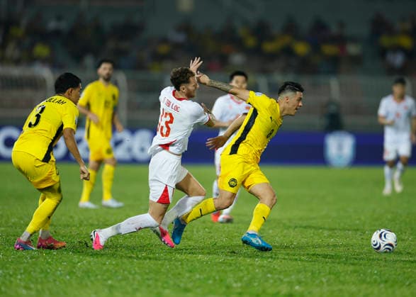 August 16, 2026, Kuala Lumpur, Malaysia: Sergio Fabian Ezequiel Aguero of Malaysia (R) and Tai Loc Nguyen of Vietnam (C) seen in action during the ASEAN Hyundai Cup 2026 First-Leg Semi-Final match between Malaysia and Vietnam at Kuala Lumpur Football Stadium. Final score; Malaysia 0:2 Vietnam Kuala Lumpur Malaysia - ZUMAs197 20260816_aaa_s197_326 Copyright: xWongxFokxLoyx