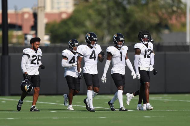 JACKSONVILLE, FL - AUGUST 17: Jacksonville Jaguars cornerback Jarrian Jones (4), Jacksonville Jaguars cornerback Montaric Brown (1), and Jacksonville Jaguars wide receiver Travis Hunter (12) walk off the field during training camp on August 17, 2026 at the Miller Electric Center in Jacksonville, Fl. (Photo by David Rosenblum Icon Sportswire) NFL, American Football Herren, USA AUG 17 Jaguars Training Camp EDITORIAL USE ONLY Icon260817238694