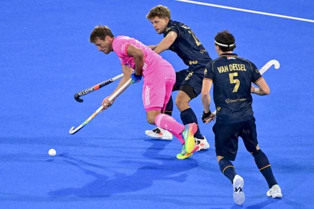 German Paul-Philipp Kaufmann; Belgium s Victor Wegnez and Belgium s Arno Van Dessel pictured in action during a hockey game between Belgian Lions and Germany, the second (out of three) matches during the group stage of the men s 2026 Hockey World Cup, Monday 17 August 2026 in Wavre. The 2026 edition of the Hockey World Cup takes place in Belgium and The Netherlands from August 15 to August 30. DIRKxWAEM  x183625264x