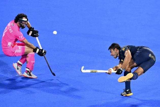 German Teo Hinrichs and Belgium s Alexander Hendrickx pictured during a hockey game between Belgian Lions and Germany, the second (out of three) matches during the group stage of the men s 2026 Hockey World Cup, Monday 17 August 2026 in Wavre. The 2026 edition of the Hockey World Cup takes place in Belgium and The Netherlands from August 15 to August 30. DIRKxWAEM  x183626869x