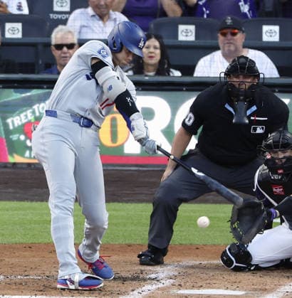 Baseball: Dodgers vs. Rockies Los Angeles Dodgers designated hitter Shohei Ohtani hits a single in the third inning of a baseball game against the Colorado Rockies at Coors Field in Denver, Colorado, on Aug. 17, 2026.  A14AA0005626102P