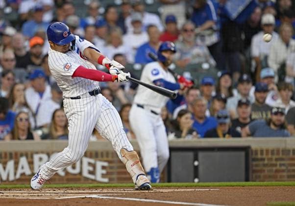 Baseball: White Sox vs. Cubs Seiya Suzuki of the Chicago Cubs hits a solo home run in the first inning of a baseball game against the Chicago White Sox at Wrigley Field in Chicago on Aug. 17, 2026.  A14AA0005626141P