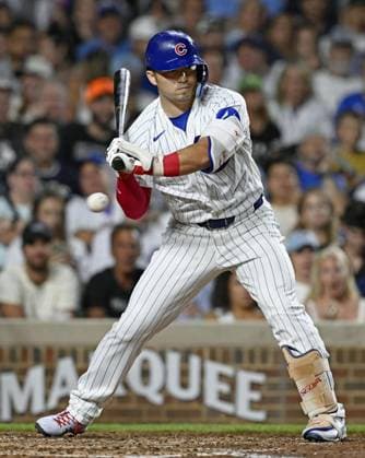 Baseball: White Sox vs. Cubs Seiya Suzuki of the Chicago Cubs draws a walk in the fifth inning of a baseball game against the Chicago White Sox at Wrigley Field in Chicago on Aug. 17, 2026.  A14AA0005626155P