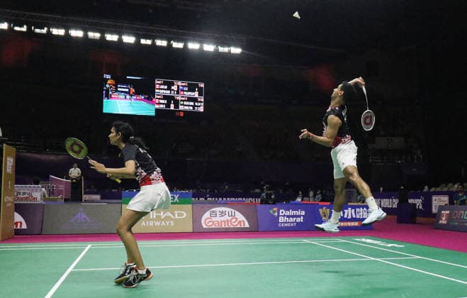 RECORD DATE NOT STATED BWF Badminton World Championships: India vs Canada New Delhi, Aug 18 (ANI): India s Rohan Kapoor and Ruthvika Shivani Gadde in action against Canada s Jonathan Bing Tsan Lai and Crystal Lai in the mixed doubles category during the BWF Badminton World Championships at Indira Gandhi Indoor Stadium, in New Delhi on Tuesday. New Delhi Delhi India Copyright: xANIx ANI_20260818045
