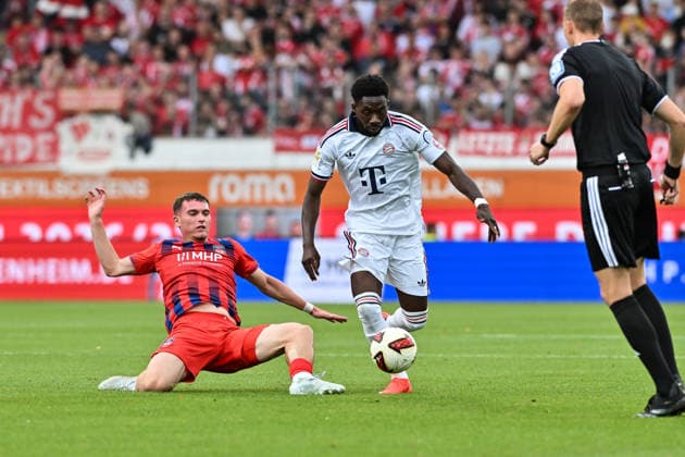Testspiel; 1. FC Heidenheim - FC Bayern München; 18.08.2026 HEIDENHEIM, GERMANY - 18. AUGUST: im Duell Paul HENNRICH (1. FC Heidenheim 8) und Alphonso DAVIES (FC Bayern Munich 19) während dem Testspiel zwischen dem 1. FC Heidenheim und dem FC Bayern München in der Voith-Arena *** Friendly Match: 1 FC Heidenheim vs. FC Bayern Munich, August 18, 2026, HEIDENHEIM, GERMANY, August 18, in a matchup between Paul HENNRICH (1 FC Heidenheim) and Alphonso DAVIES (FC Bayern Munich) during the friendly match between 1 FC Heidenheim and FC Bayern Munich at the Voith Arena Copyright: xBEAUTIFULxSPORTS Goldbergx