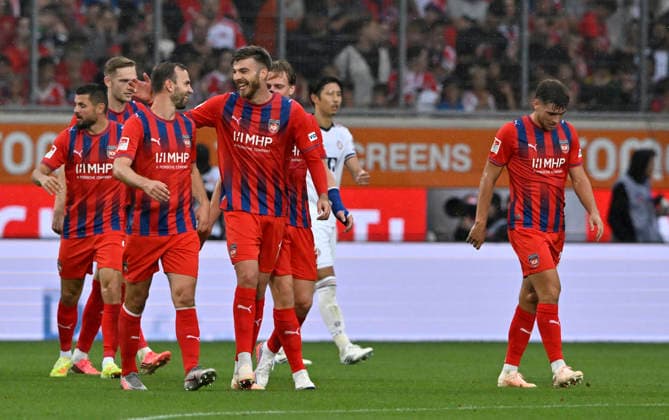 TOR zum 2:1 Julian Niehues 1. FC Heidenheim 1846 FCH (16) Torjubel mit Kollegen 1. FC Heidenheim 1846 FCH vs FC Bayern Muenchen FCB TESTSPIEL 18.08.2026 DFL REGULATIONS PROHIBIT ANY USE OF PHOTOGRAPHS AS IMAGE SEQUENCES AND OR QUASI-VIDEO 1. FC Heidenheim 1846 FCH vs FC Bayern Muenchen FCB TESTSPIEL *** GOAL: 2-1 Julian Niehues 1 FC Heidenheim 1846 FCH 16 Celebrating the goal with teammates 1 FC Heidenheim 1846 FCH vs. FC Bayern Munich FCB Friendly Match August 18, 2026 DFL Regulations ProhibitIBIT ANY USE OF PHOTOGRAPHS AS IMAGE SEQUENCES AND OR QUASI-VIDEO 1 FC Heidenheim 1846 FCH vs. FC Bayern Munich FCB FRIENDLY MATCH