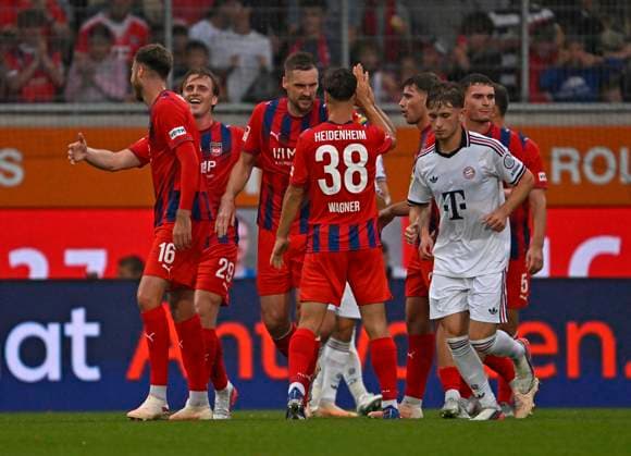 18.08.2026, Fussball Bundesliga 2026 2027, Testspiel, 1.FC Heidenheim - FC Bayern München, in der Voith-Arena Heidenheim, v.l. Julian Niehues (1. FC Heidenheim 1846), Mikkel Kaufmann (1. FC Heidenheim 1846) jubeln nach dem 2:1 *** August 18, 2026, 2026–2027 Bundesliga, Friendly Match, 1. FC Heidenheim vs. FC Bayern Munich, at the Voith Arena in Heidenheim; from left: Julian Niehues (1. FC Heidenheim 1846) and Mikkel Kaufmann (1. FC Heidenheim 1846) celebrate after the 2–1 victory
