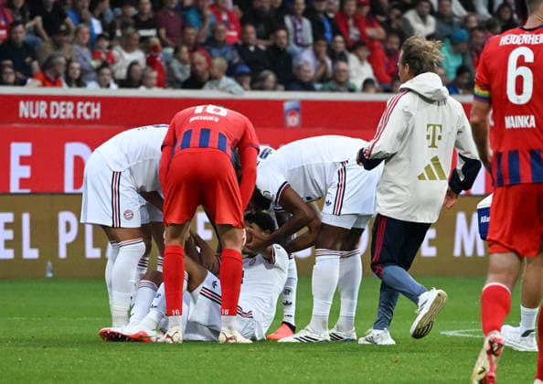 18.08.2026, xsltx, Fussball Testspiel, 1.FC Heidenheim - FC Bayern München v.l. Jamal Musiala (FC Bayern München) wieder am Boden und Sorgen bei den Bayern (DFL DFB REGULATIONS PROHIBIT ANY USE OF PHOTOGRAPHS as IMAGE SEQUENCES and or QUASI-VIDEO) *** August 18, 2026, xsltx, Soccer Friendly Match, 1 FC Heidenheim vs. FC Bayern Munich: Jamal Musiala. FC Bayern Munich Down Again, Concerns Mount at Bayern. DFL and DFB regulations prohibit any use of photographs as image sequences and or quasi-video.