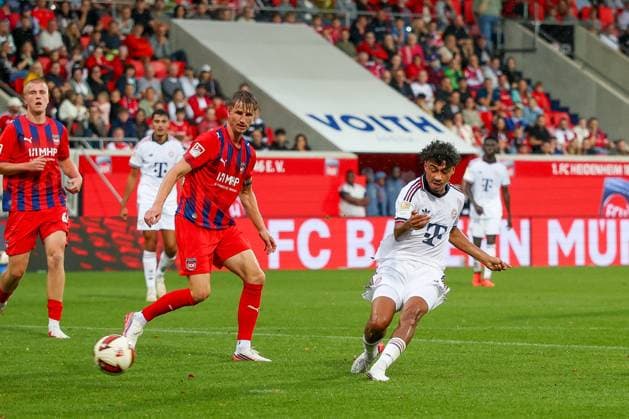 Nathaniel Brown 11 (FC Bayern Muenchen) erzielt das 2:4, daneben Jan Schoeppner 3 (1FC Heidenheim 1846), 1. FC Heidenheim 1846 vs. FC Bayern Muenchen, Fussball, Maenner, Bundesliga, Freundschaftsspiel, Friendly Match, Saison 2026 2027, 18.08.2026 DFB regulations prohibit any use of photographs as image sequences and or quasi-video Heidenheim Baden-Wuerttemberg Deutschland *** Nathaniel Brown (11, FC Bayern Munich) scores the 2-4 goal; next to him is Jan Schoeppner (3, 1. FC Heidenheim 1846), 1 FC Heidenheim 1846 vs. FC Bayern Munich, Soccer, Men, Bundesliga, Friendly Match, Season 2026–2027, August 18, 2026. DFB regulations prohibit any use of photographs as image sequences and or quasi-video. Heidenheim, Baden-Württemberg, Germany Copyright: xkolbert-press MartinxAgüerax