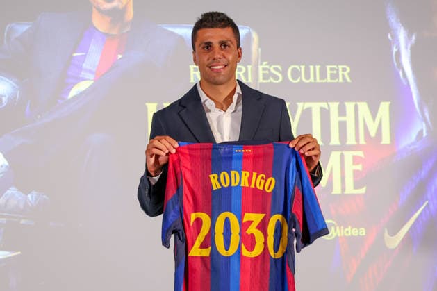 Rodri officially presented as Barcelona player BARCELONA, SPAIN - AUGUST 18: Rodrigo Hernandez Rodri of FC Barcelona, Barca poses with an FC Barcelona shirt bearing his name and the year 2030 during his official presentation as an FC Barcelona player at Spotify Camp Nou on August 18, 2026, in Barcelona, Spain. Adria Puig Anadolu Barcelona Spain. Editorial use only. Please get in touch for any other usage.  Copyright: x2026xAnadoluxAdriaxPuigx