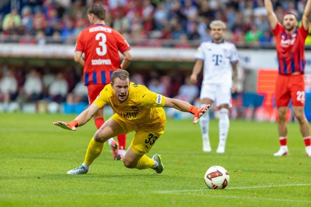 Thomas Daehne (1.FC Heidenheim, 33) parriert Torchance Blick auf den Ball, GER, 1. FC Heidenheim vs. FC Bayern Muenchen, Fußball, Testspiel, 2026 2027, 18.08.2026, DFL DFB REGULATIONS PROHIBIT ANY USE OF PHOTOGRAPHS AS IMAGE SEQUENCES AND OR QUASI-VIDEO, GER, 1. FC Heidenheim vs. FC Bayern Muenchen, Fußball, Testspiel, 2026 2027, 18.08.2026 Heidenheim *** Thomas Daehne, 1 FC Heidenheim, 33, saves a scoring chance; looking at the ball, GER, 1 FC Heidenheim vs. FC Bayern Munich, soccer, friendly match, 2026–2027, August 18, 2026, DFL and DFB regulations prohibit any use of photographs as image sequences and or quasi-video, GER, 1 FC Heidenheim vs. FC Bayern Munich, soccer, friendly match, 2026–2027, August 18, 2026, Heidenheim Copyright: xEibner-Pressefoto JanixPlessx EP_JPL