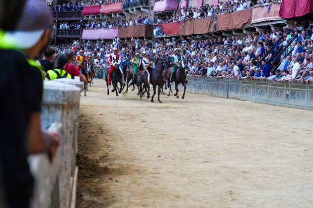 August 18, 2026, Siena, Toscana, italia: The Nicchio Contrada wins the Palio with the horse Teodoro and jockey Giovanni Atzeni, known as Tittia, during the Siena Palio held on August 18, 2026, in Siena s Piazza del Campo. Palio Of Siena Of August 18, 2026  - ZUMAs236 20260818_aap_s236_009 Copyright: xFabioxSassox